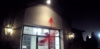 A video provided by a group claiming to be Palestine Action Canada showing red paint being splattered on the entrance to GeoSpectrum Technologies Inc. on Whittington Drive in Peterborough in the early morning hours of October 12, 2026. (kawarthaNOW screenshot)