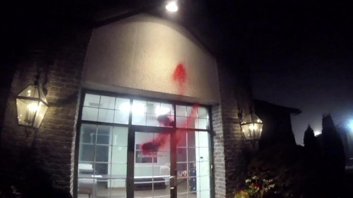 A video provided by a group claiming to be Palestine Action Canada showing red paint being splattered on the entrance to GeoSpectrum Technologies Inc. on Whittington Drive in Peterborough in the early morning hours of October 12, 2026. (kawarthaNOW screenshot)