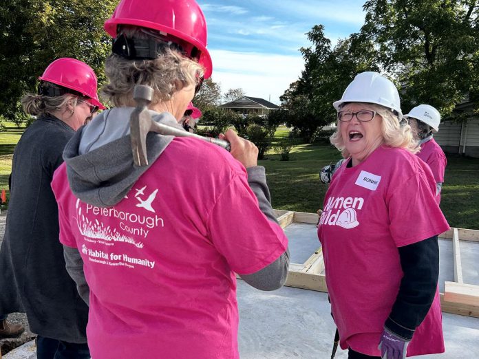 Peterborough County warden Bonnie Clark (right) volunteering with the county's team during the Women Build event hosted by Habitat for Humanity Peterborough & Kawartha Region (Habitat PKR) from September 21 to 24, 2026 in Norwood, where Habitat PKR is constructing three affordable homes for local families. (Photo courtesy of Habitat PKR)