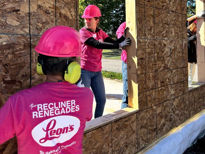 Volunteers, including from the Leon's Peterborough team, helping to raise walls during the Women Build event hosted by Habitat for Humanity Peterborough & Kawartha Region (Habitat PKR) from September 21 to 24, 2026 in Norwood, where Habitat PKR is constructing three affordable homes for local families. (Photo courtesy of Habitat PKR)
