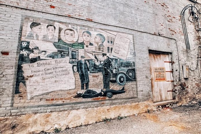 The Halloween season is a good time of year to take the self-guided walking tour of the filming locations in Port Hope for the movies and TV series based on Stephen King's horror novel "IT." One of the locations includes a mural displaying the history of the fictional town of Derry. (Photo: Port Hope Tourism)