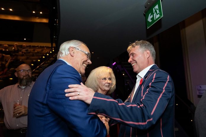 Former Peterborough mayor Daryl Bennett and his wife Jewell congratulate mayor-elect Michael Eamon at Market Hall Performing Arts Centre in downtown Peterborough on October 26, 2026. (Photo: Jordan Lyall / kawarthaNOW)