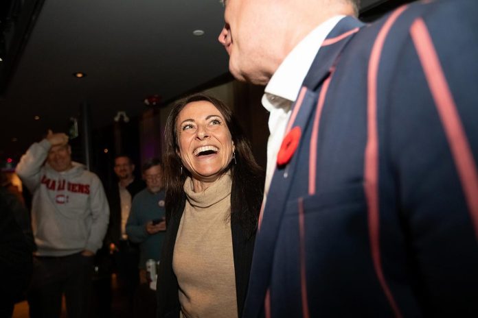 Former Peterborough mayor Diane Therrien-Hale reacts as mayor-elect Michael Eamon celebrates his victory at Market Hall Performing Arts Centre in downtown Peterborough on October 26, 2026. (Photo: Jordan Lyall / kawarthaNOW)