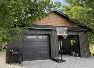 Merrett Home Hardware Building Centre helps bring your dream garage to life A recently completed garage project built through Merrett Home Hardware Building Centre's Beaver Homes & Cottages program. The program offers more than 500 pre-designed garages and carriage homes, which can be altered to fit each customer's lifestyle and preferences. In addition to providing premium-grade materials for the build, the program includes support from a local consultant to finalize designs, navigate permits, and find a local contractor. (Photo courtesy of Merrett Home Hardware Building Centre)