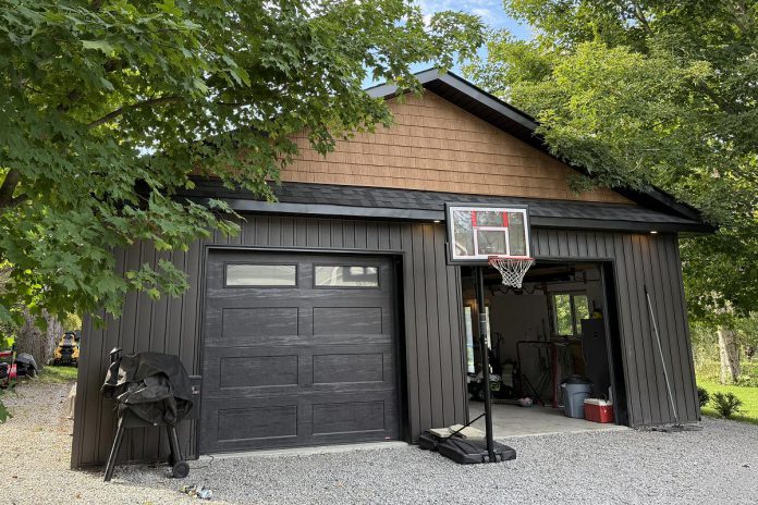 A recently completed garage project built through Merrett Home Hardware Building Centre's Beaver Homes & Cottages program. The program offers more than 500 pre-designed garages and carriage homes, which can be altered to fit each customer's lifestyle and preferences. In addition to providing premium-grade materials for the build, the program includes support from a local consultant to finalize designs, navigate permits, and find a local contractor. (Photo courtesy of Merrett Home Hardware Building Centre)