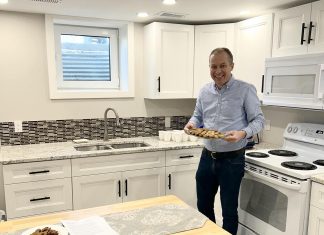 Beyond emergency shelter: One City Peterborough and its partners are creating stable affordable housing in backyards and basements One City Peterborough's director of property development Michael VanDerHerberg in the kitchen of a self-contained basement apartment, which is part of a partnership with Peterborough Action for Tiny Homes (PATH) to construct additional rental units that provide supportive housing options for tenants of residential properties owned by One City Peterborough. (Photo courtesy of One City Peterborough)