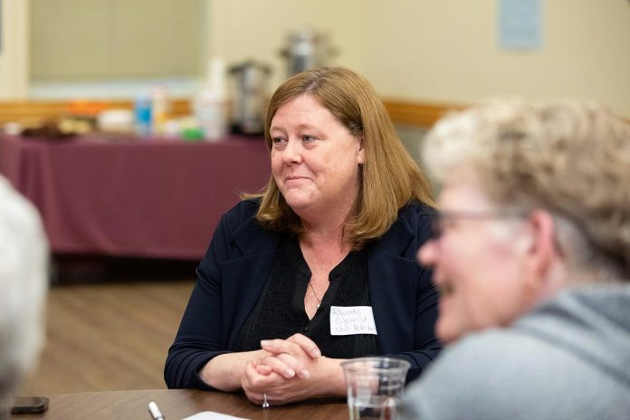 Rhonda Gilchrist, former senior director of operations and revenue generation at United Way Peterborough & District, during an event to discuss One City Peterborough’s housing strategy at Knights of Columbus Hall on May 12, 2026. The United Way has supported One City’s purchase of a home on Stewart Street through the federally funded the Reaching Home program. (Photo: Jordan Lyall / kawarthaNOW)