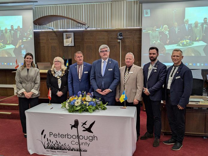 The signing ceremony of a twinning agreement between Peterborough County and the western Ukraine municipality of Drohobych took place in council chambers at the  Peterborough County Courthouse on October 14, 2026. Attendees included (from left) Peterborough MP Emma Harrison, Peterborough County warden Bonnie Clark, Drohobych mayor Taras Kuchma, and Ukraine's ambassador to Canada Andrii Plakhotniuk. (Photo: Peterborough County)