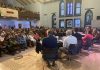 Peterborough's seven mayoral candidates attended a community discussion at New Canadians Centre on October 7, 2026, with around 250 people in the audience and another 200 online. (Photo: Paul Rellinger / kawarthaNOW)