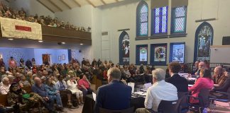 Peterborough's seven mayoral candidates attended a community discussion at New Canadians Centre on October 7, 2026, with around 250 people in the audience and another 200 online. (Photo: Paul Rellinger / kawarthaNOW)