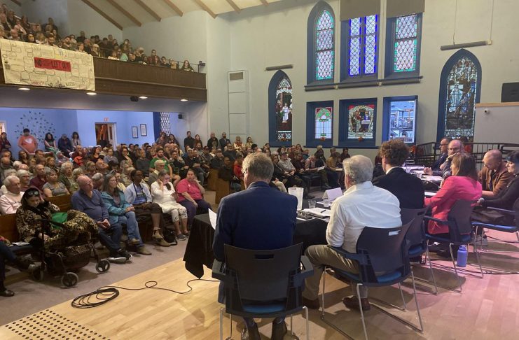 Peterborough’s mayoral candidates address housing, public trust, and social challenges at community debate Peterborough's seven mayoral candidates attended a community discussion at New Canadians Centre on October 7, 2026, with around 250 people in the audience and another 200 online. (Photo: Paul Rellinger / kawarthaNOW)