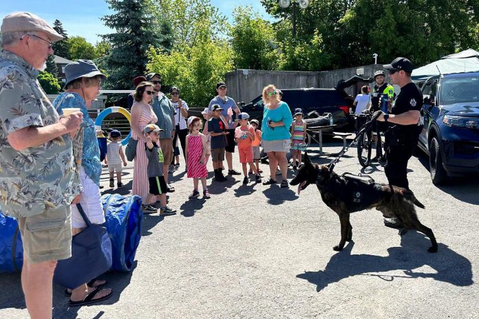 Peterborough police constable Dillon Wentworth and Gryphon at a community event. (Photo: Peterborough Police Service)