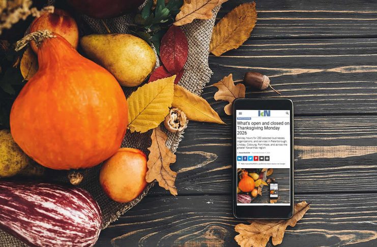 What’s open and closed on Thanksgiving Monday 2026 A smartphone sitting on a harvest table covered with squash and fall leaves displaying kawarthaNOW's Thanksgiving Monday 2026 holiday hours story. (kawarthaNOW photo)